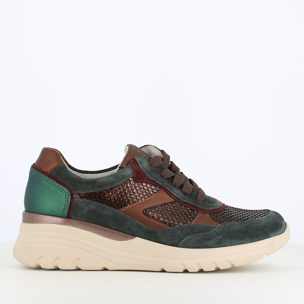 Multicolored sneaker with green, brown, and beige accents on a white background