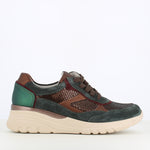 Multicolored sneaker with green, brown, and beige accents on a white background