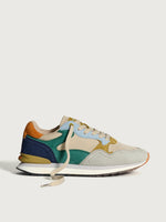 Multicolored sneaker on a light gray background