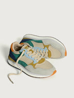Colorful sneaker with a unique design on a light gray background