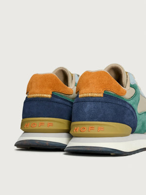 Pair of multicolored sneakers with 'HOFF' branding on a light gray background
